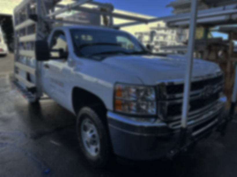 Sunny's Detailing working on a car exterior